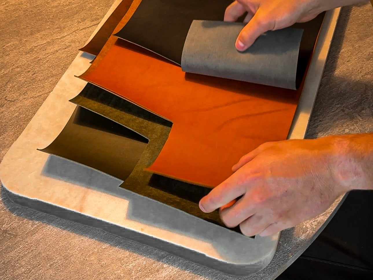 Selecting leather hides by hand